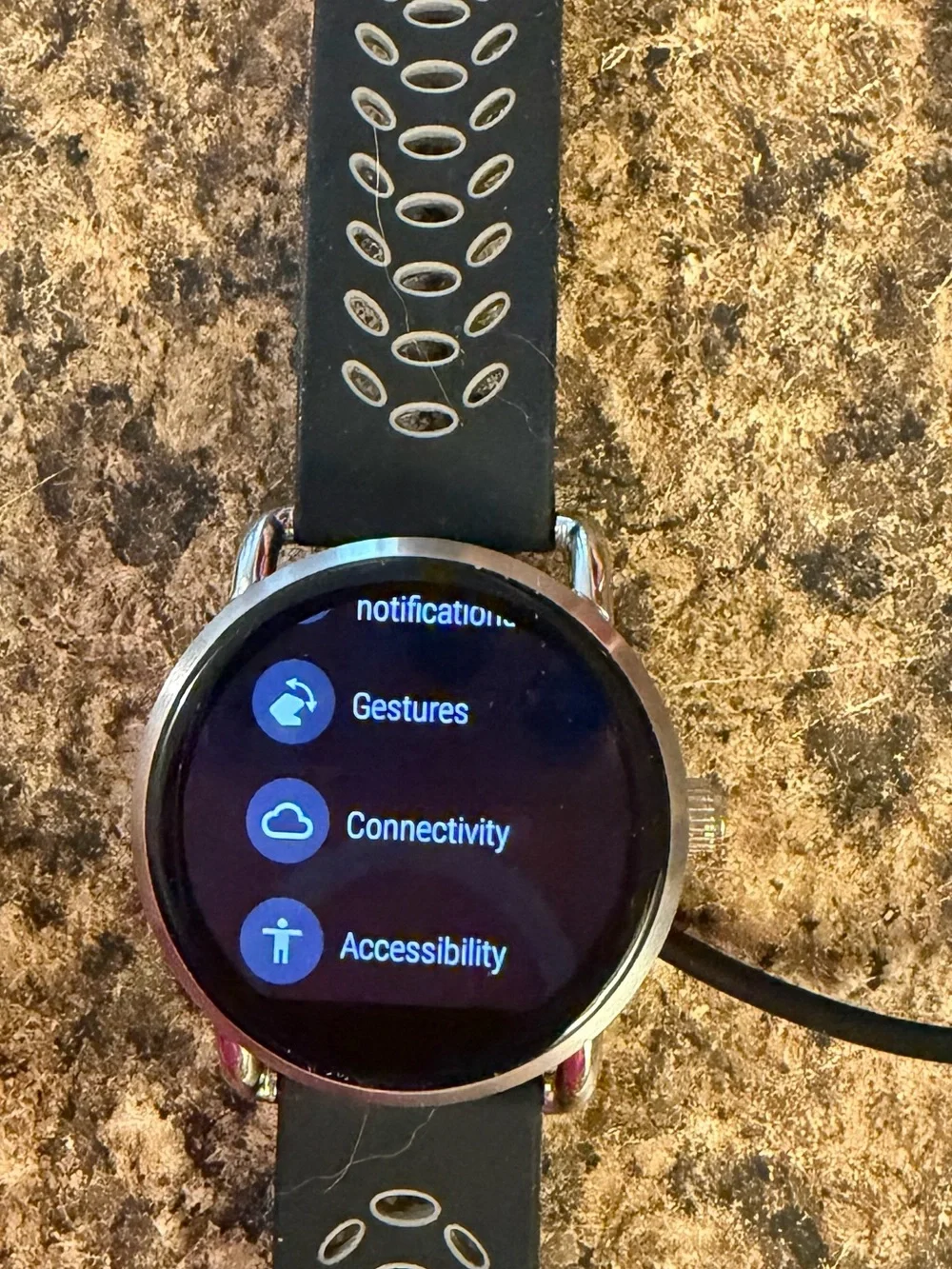Fossil Q Wander Smartwatch with silicone and silver metal band and charger